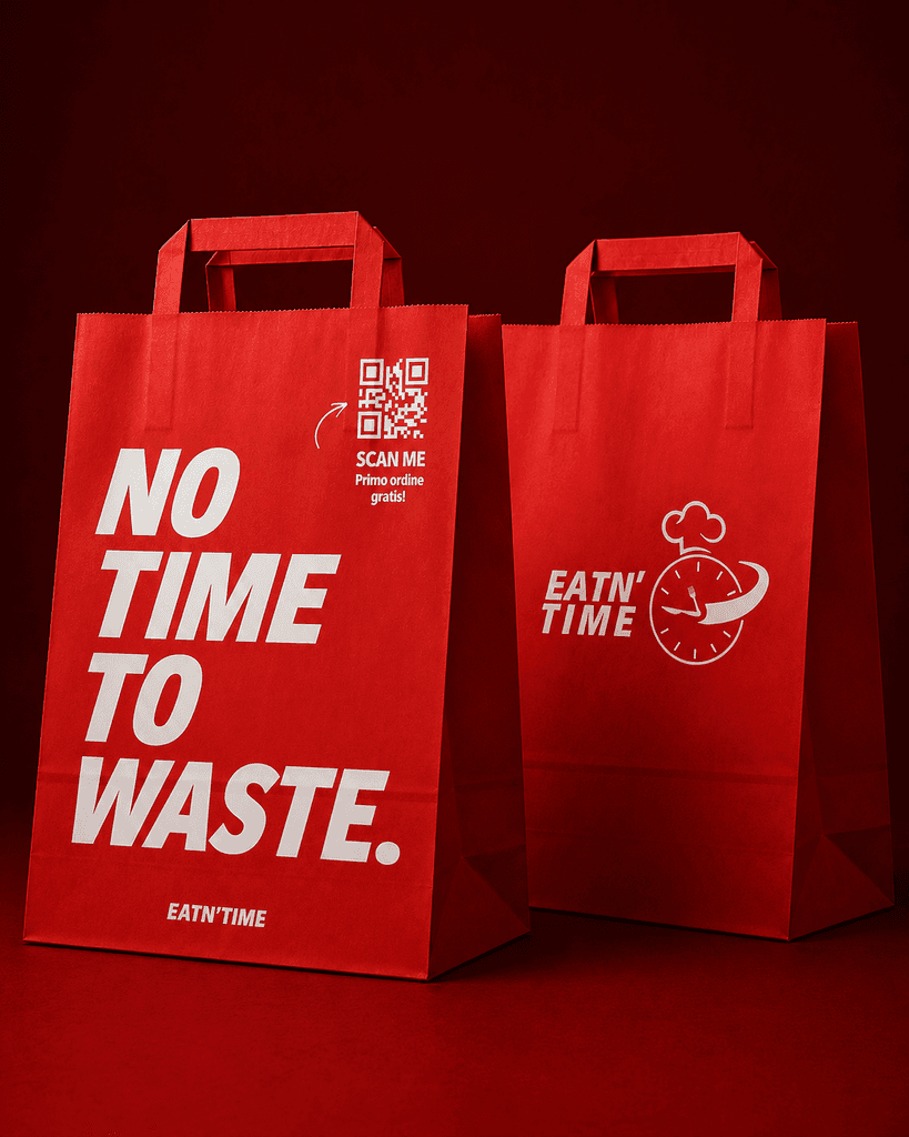 Le borse rosse EATN’TIME per il take-away, con la scritta No time to waste